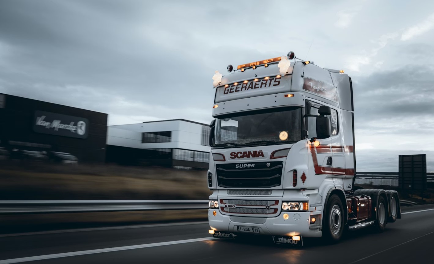 Truck driver reviewing insurance policy to understand exclusions and gaps